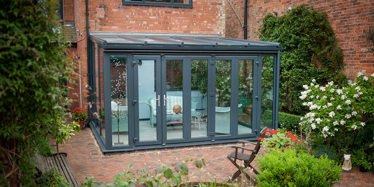 Modern Lean-To Conservatory Finished in Grey UPVC by 5 Star Conservatories