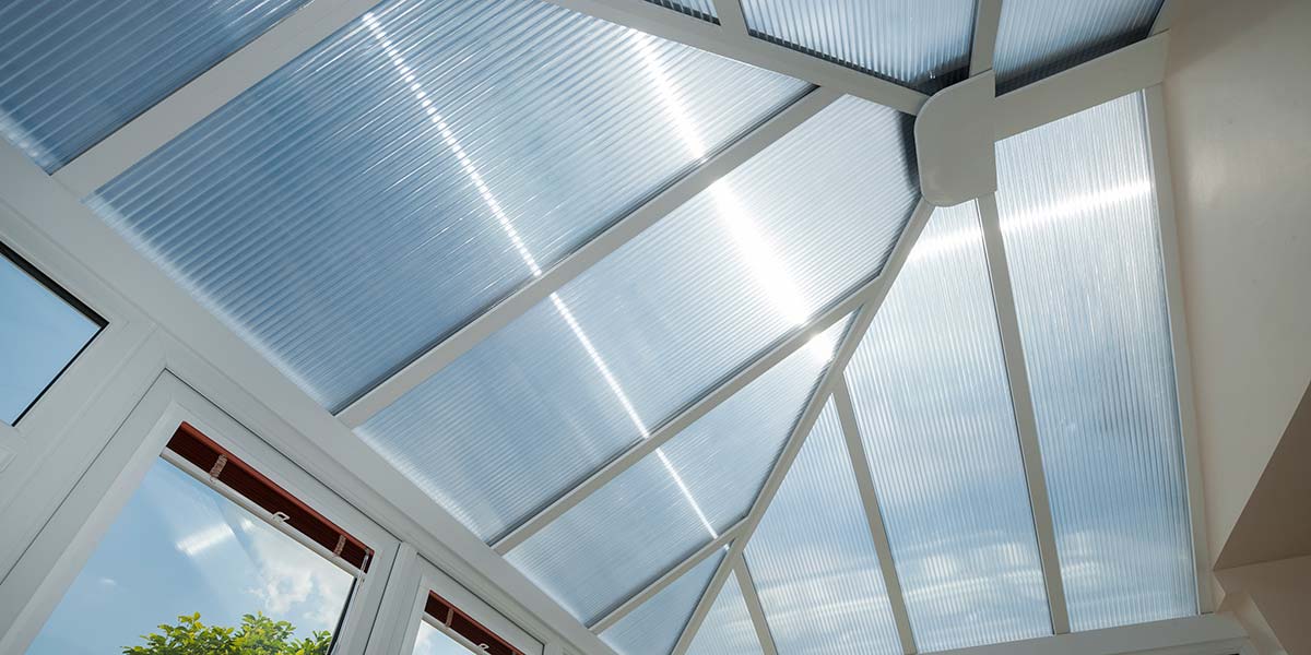 White UPVC Conservatory With Polycarbonate Roof by 5 Star