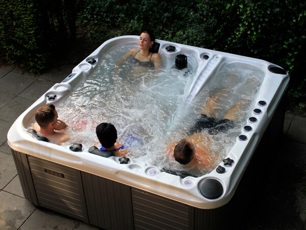 Passion Spa hot tub with 4 people in the water